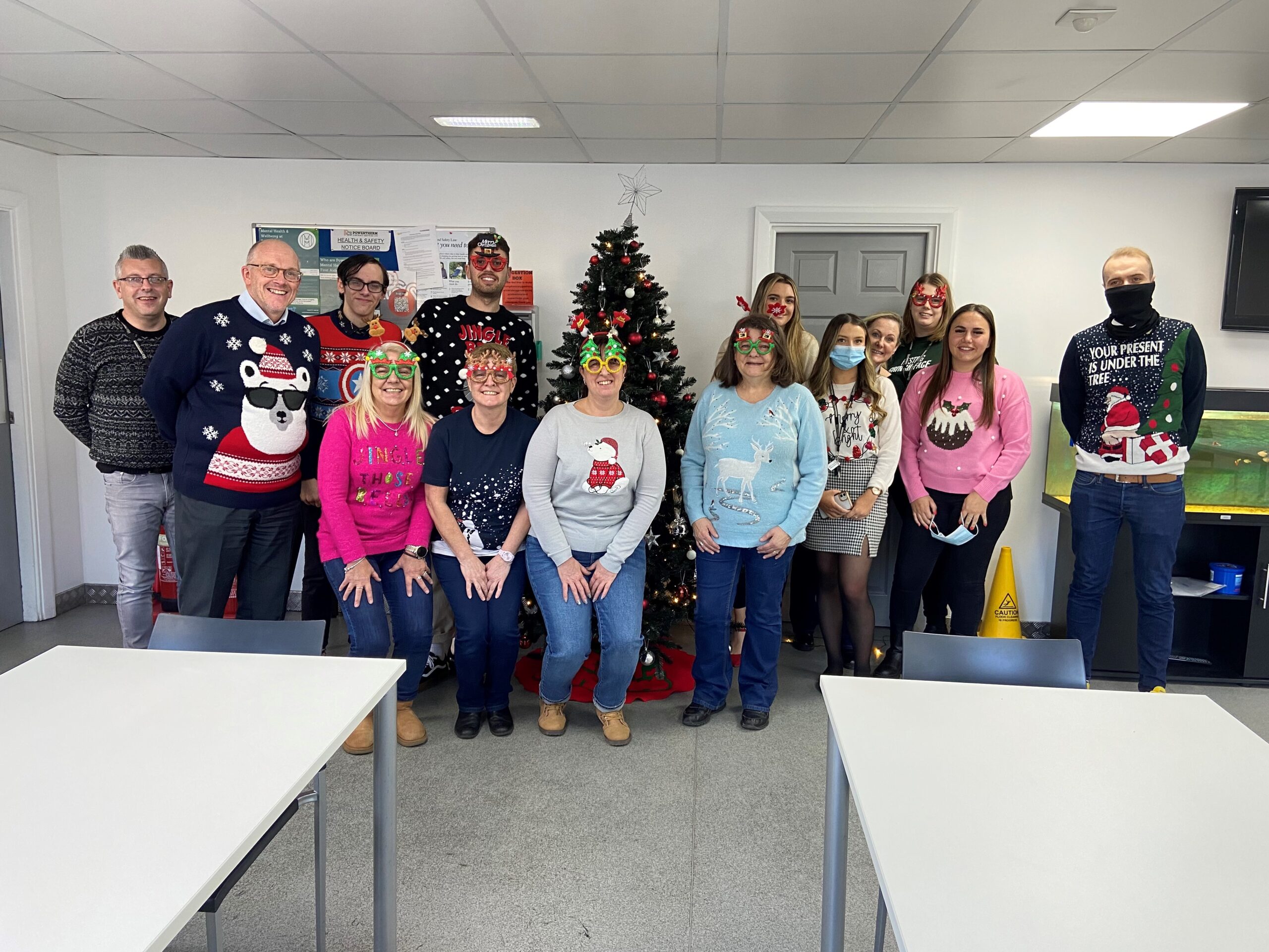 Powertherm staff pull on their Christmas Jumpers for Save the Children
