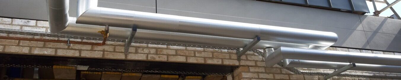 Insulated and cladded piping at a crematorium